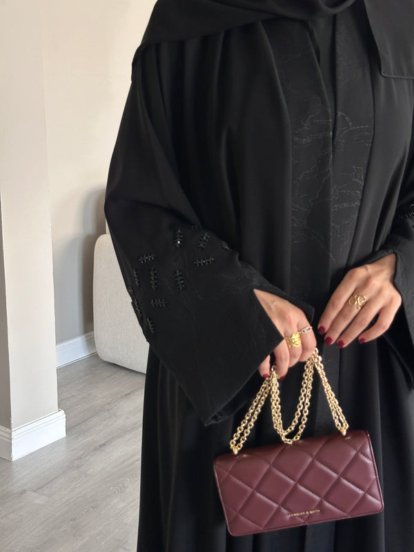 #130 black Abaya with shaak on the sleeves