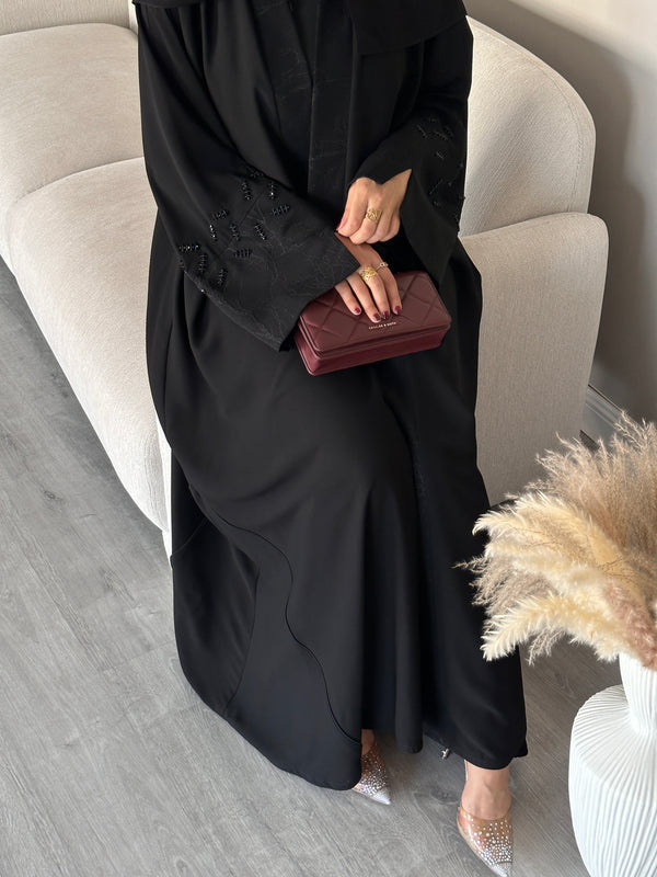 #130 black Abaya with shaak on the sleeves